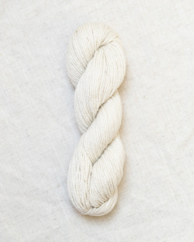 White skein of yarn on a white background
